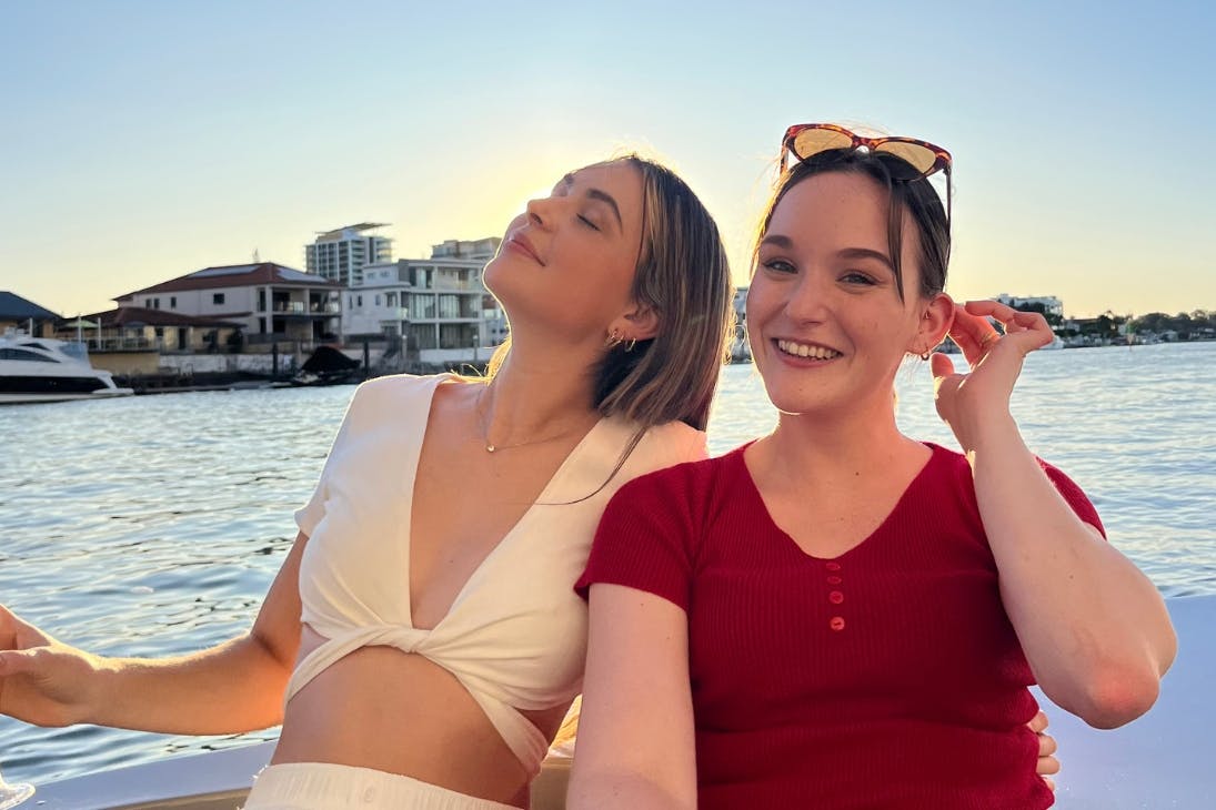 Two people smiling